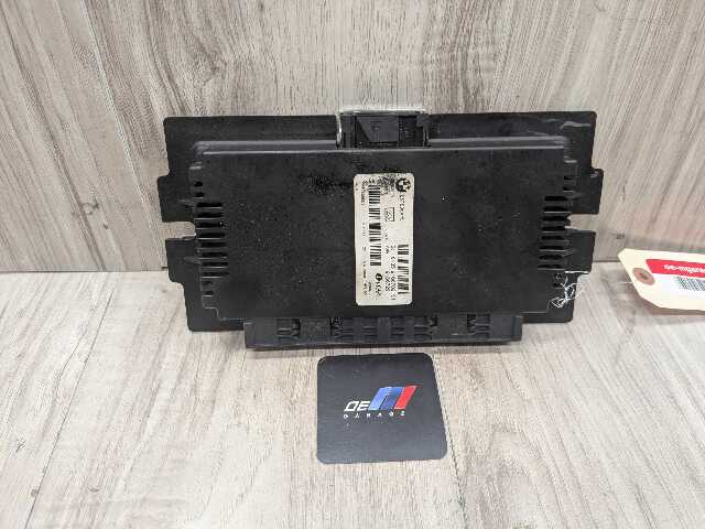 06-10 OEM BMW E90 E92 M3 328 335 AHL FRM II 2 Footwell Light Control Module