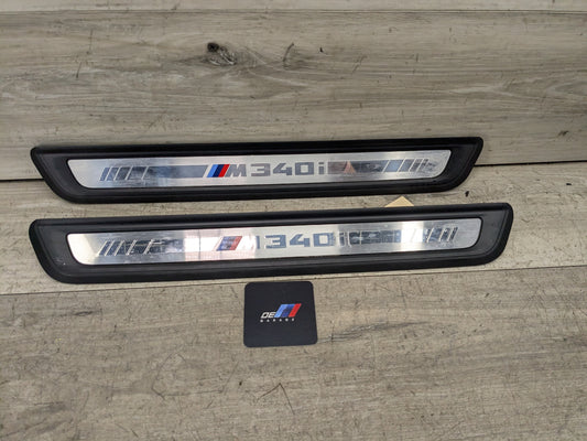 20-22 OEM BMW G20 M340i Front Door Sill Plate Molding Trim SET