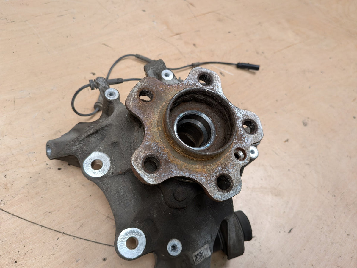 2016-2022 BMW 750i G12 Rear Left Driver Spindle Knuckle w/ Bearing 6861135 OEM