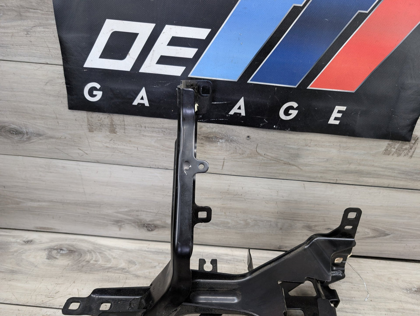 2019-2026 BMW X5 G05 Left Driver Headlight Bracket 7421710