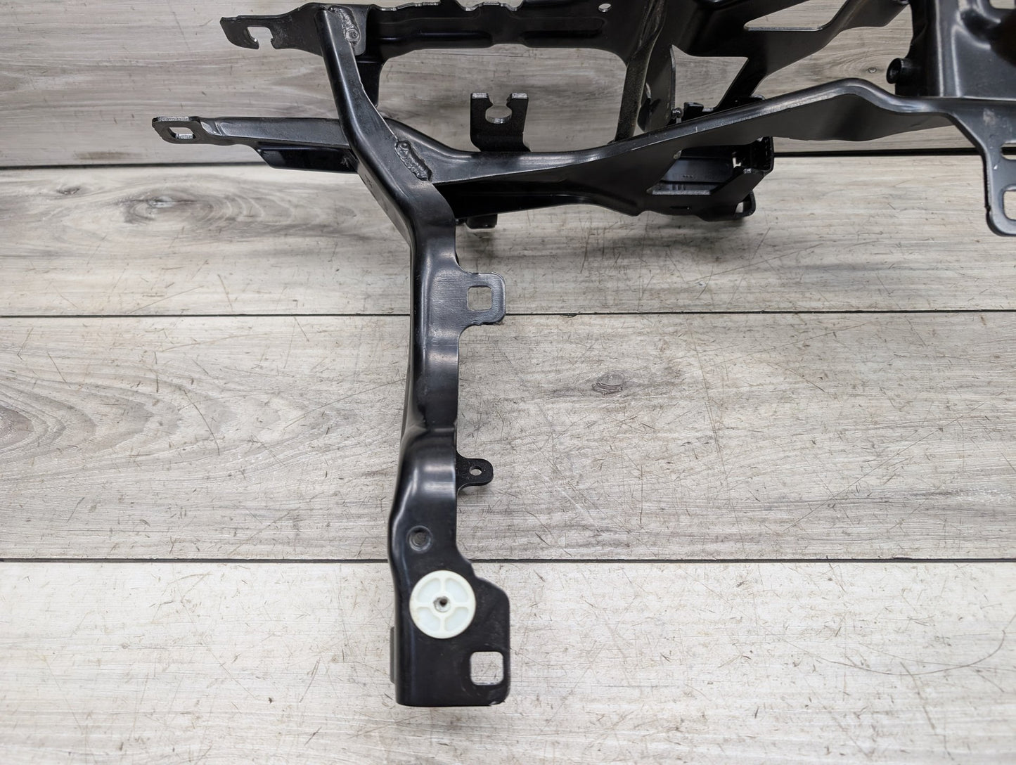 2019-2026 BMW X5 G05 Left Driver Headlight Bracket 7421710