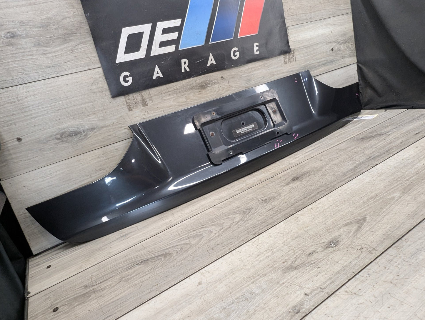 16-19 OEM BMW G12 740 750 Trunk Lid License Plate Lower Finish Panel