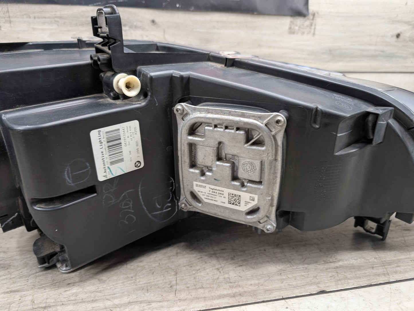 11-13 OEM BMW X5 E70- Front Left Driver Xenon AHL Headlight PN: 7294605