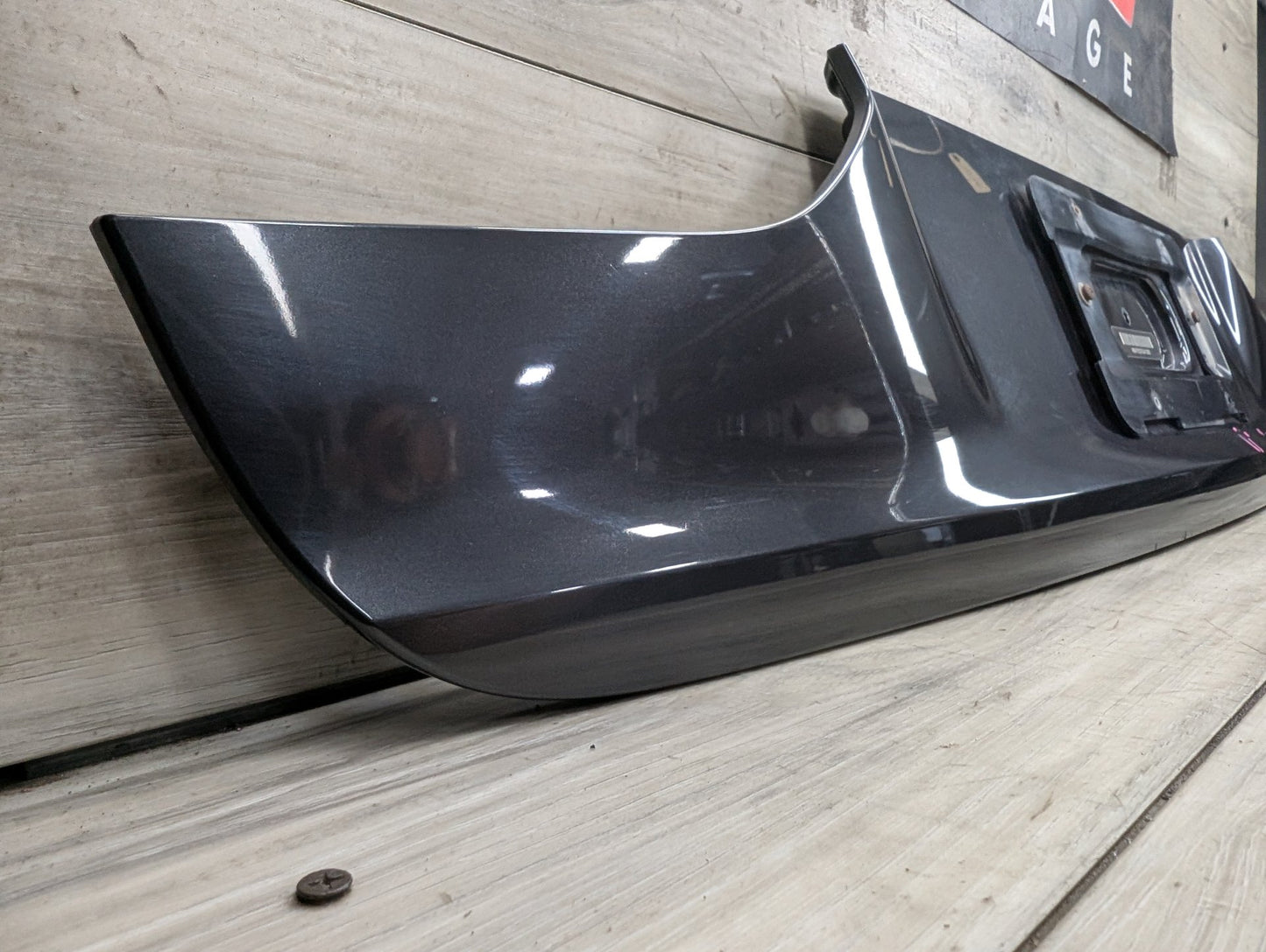 16-19 OEM BMW G12 740 750 Trunk Lid License Plate Lower Finish Panel