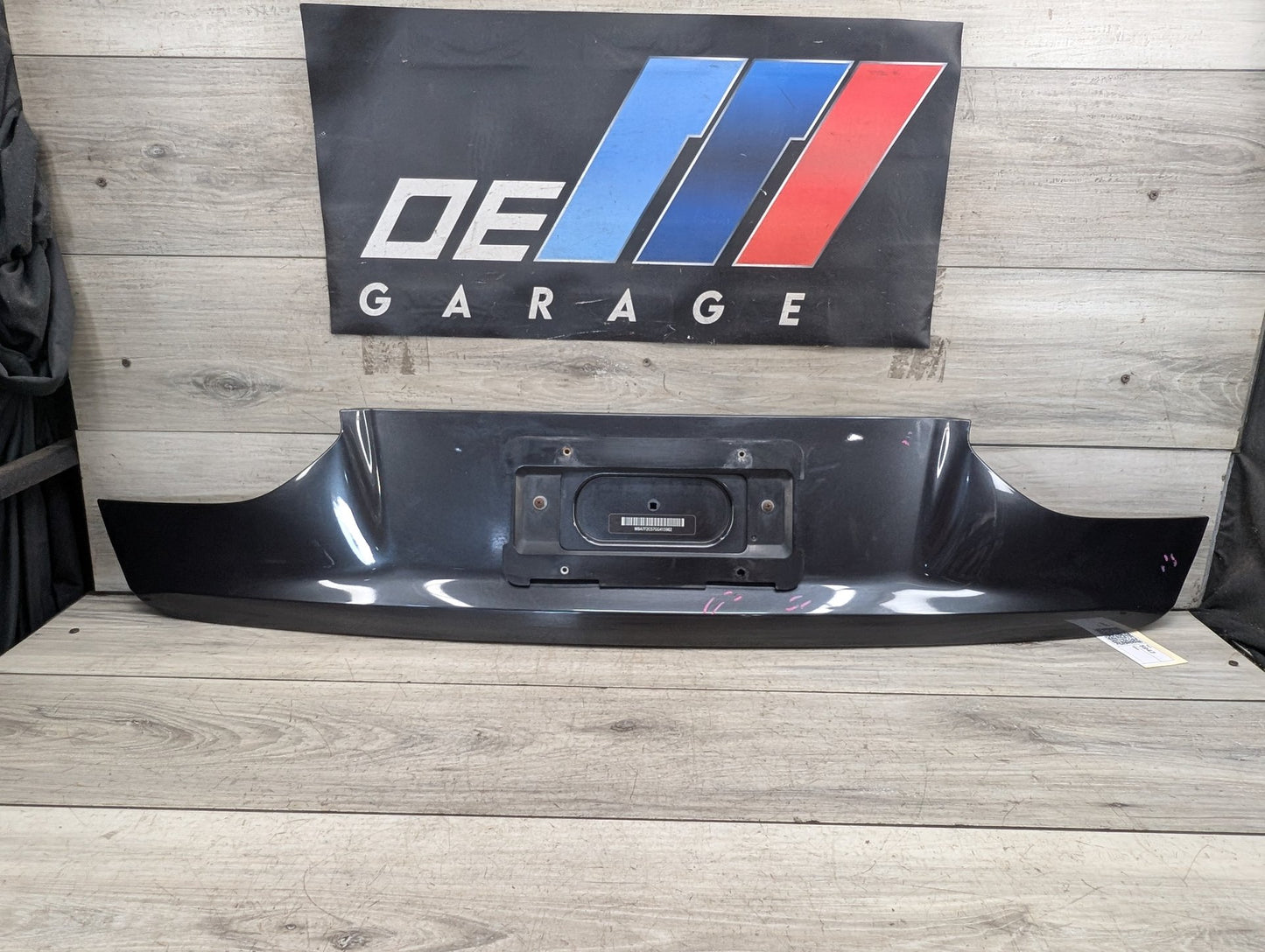 16-19 OEM BMW G12 740 750 Trunk Lid License Plate Lower Finish Panel