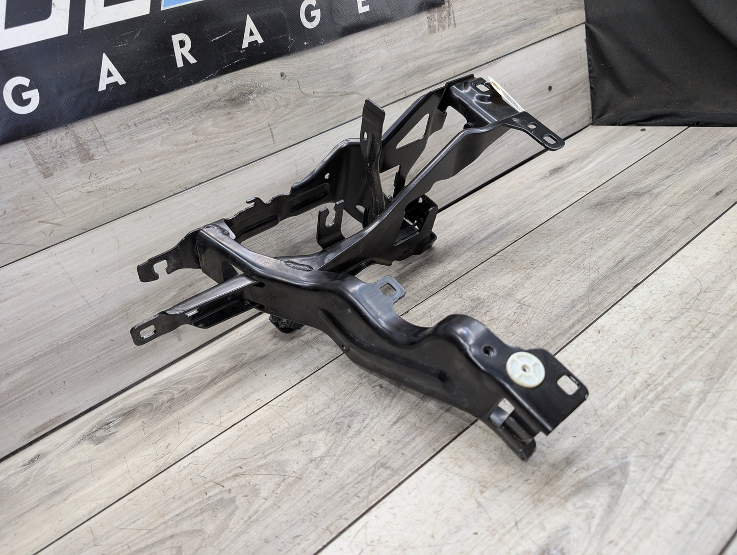 2019-2026 BMW X5 G05 Left Driver Headlight Bracket 7421710