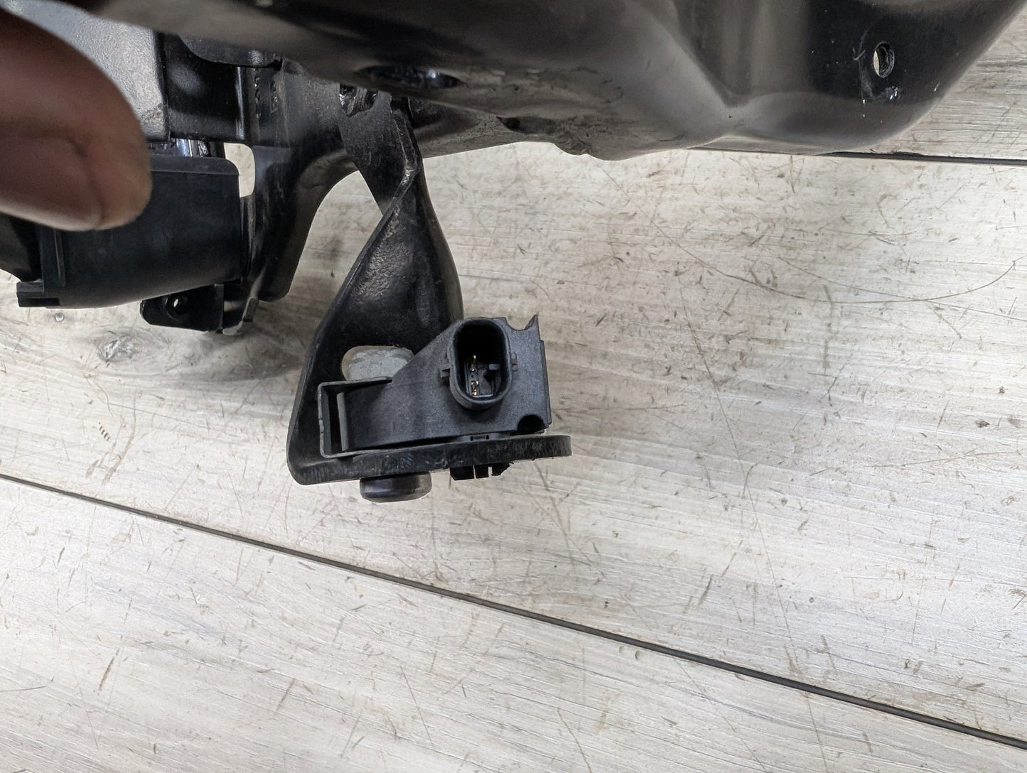 2019-2026 BMW X5 G05 Left Driver Headlight Bracket 7421710